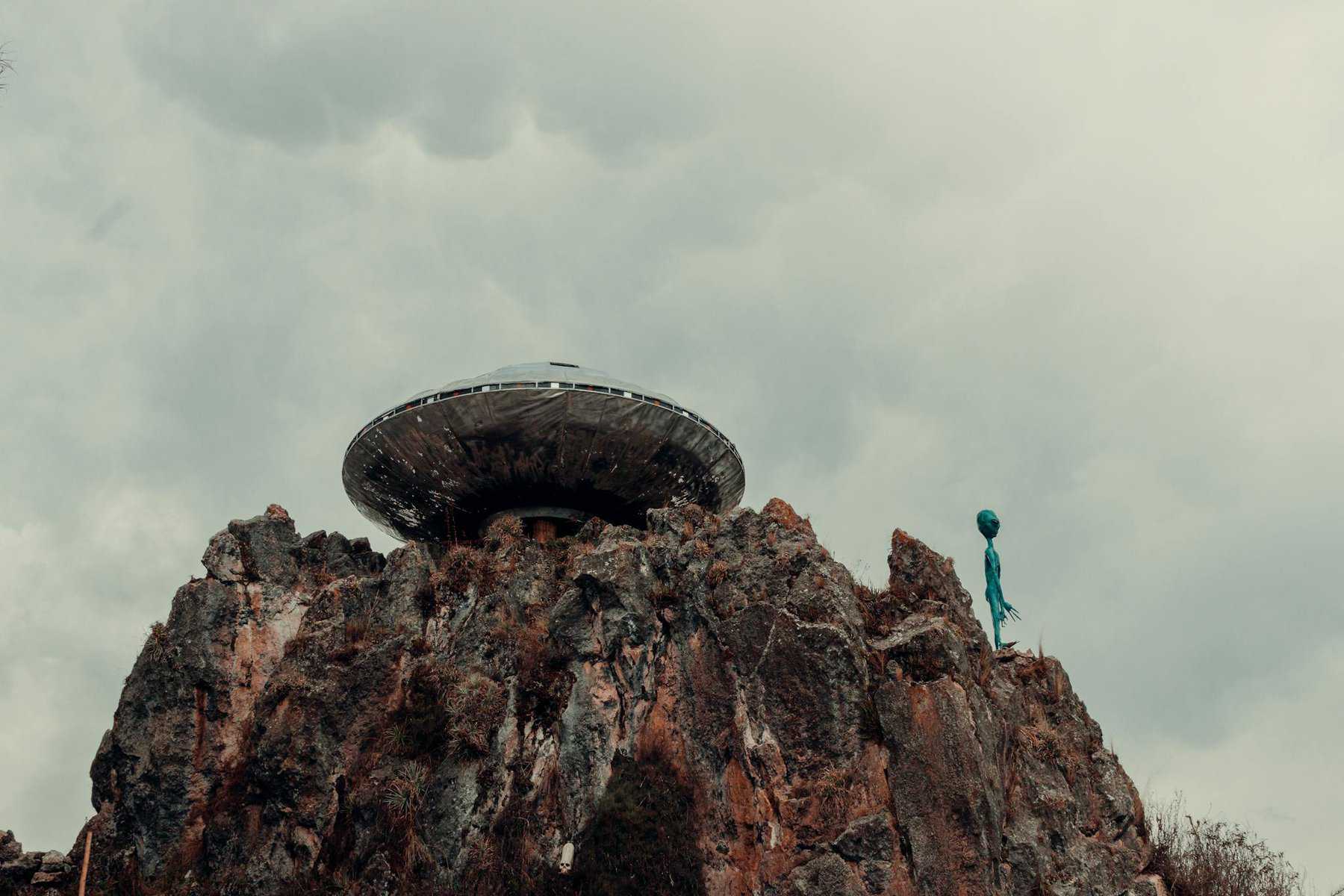 Ufo And An Alien On A Rock